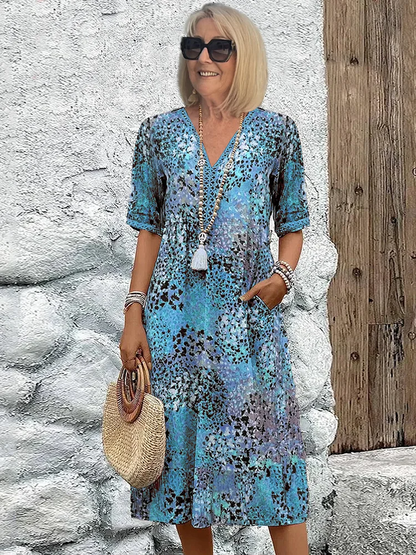 Sommerkleid Damen: Boho Midikleid mit V-Ausschnitt und Taschen-HauteBerlin