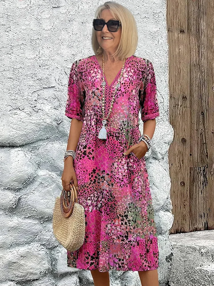 Sommerkleid Damen: Boho Midikleid mit V-Ausschnitt und Taschen-HauteBerlin