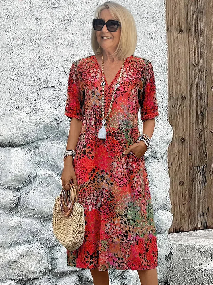 Sommerkleid Damen: Boho Midikleid mit V-Ausschnitt und Taschen-HauteBerlin