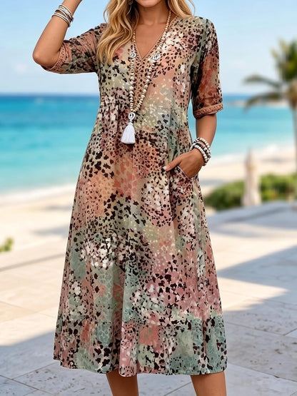 Sommerkleid Damen: Boho Midikleid mit V-Ausschnitt und Taschen-HauteBerlin