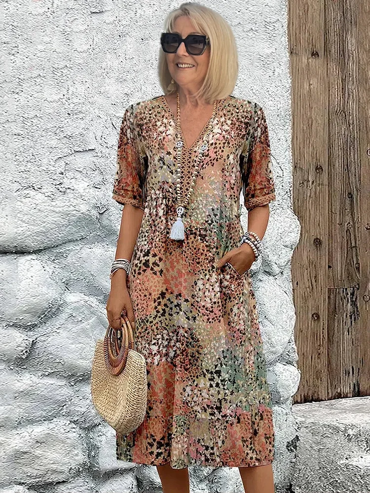 Sommerkleid Damen: Boho Midikleid mit V-Ausschnitt und Taschen-HauteBerlin