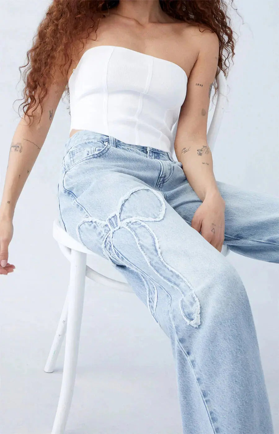 Weite Jeans | Hellblau | Schleifendetail | Locker sitzende Jeans | Damenjeans-HauteBerlin