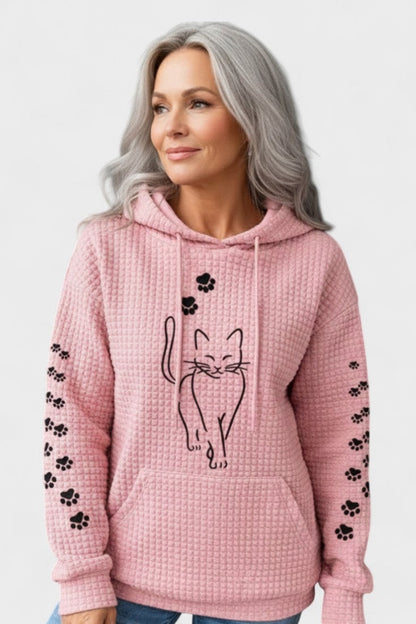 Rosa Hoodie mit Waffelstruktur, schwarzer Katze und Pfoten