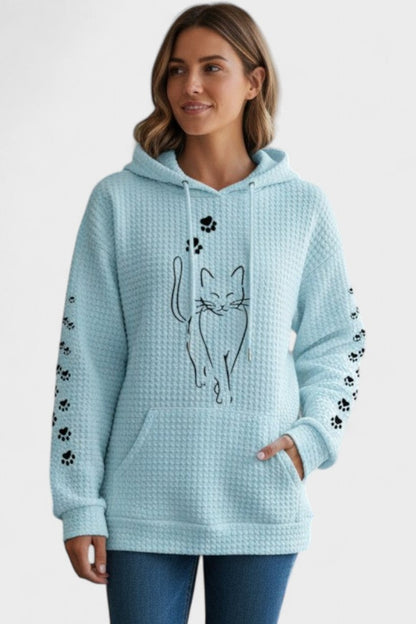 Hellblauer Hoodie mit Waffelstruktur und schwarzem Katzenprint