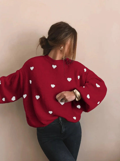 Roter Oversize-Pullover mit weißen Herzen