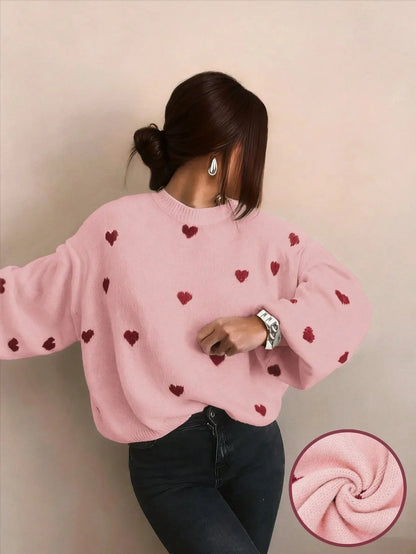 Rosa Oversize-Pullover mit dunkelroten Herzen