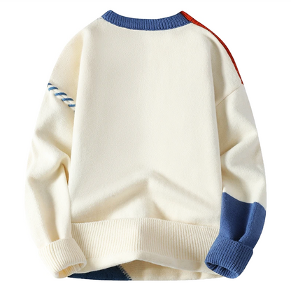 Rückansicht des cremefarbenen Patchwork-Strickpullovers