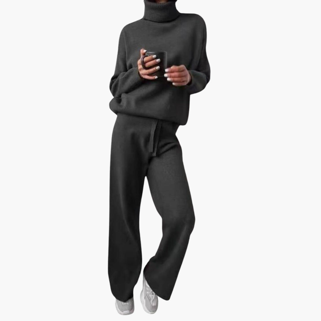 Strick-Zweiteiler in Schwarz mit Rollkragenpullover und weiter Hose mit Tunnelzug